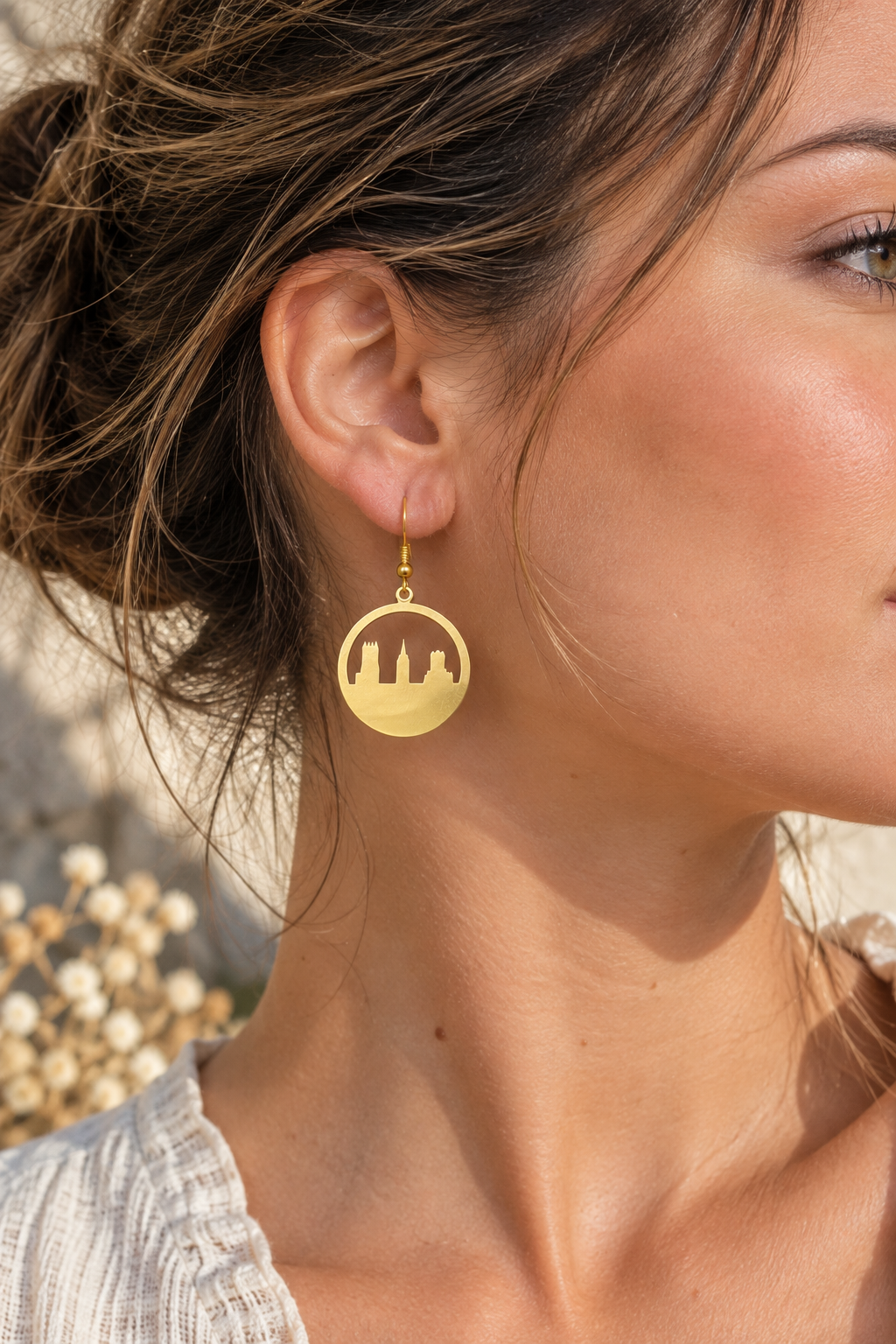 Circle Skyline Earrings Gold worn by a model